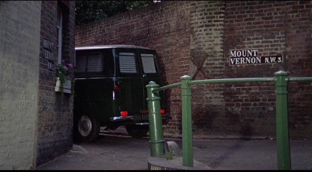 Freddie (Terence Stamp) stalks his prey in an unmarked van in William Wyler's The Collector (1965)