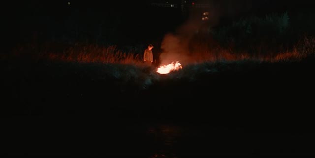 Misumi (Kôji Yakusho) kills his boss by the river in Hirokazu Kore-eda's The Third Murder (2017)