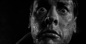 Miles (Kevin McCarthy) realizes that Becky (Dana Wynter) has also been taken over in Don Siegel's Invasion of the Body Snatchers ...