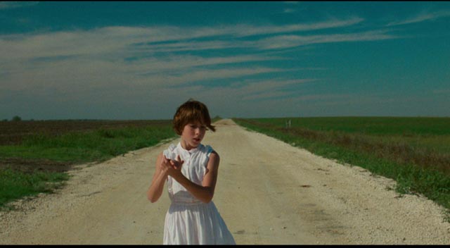 Capucine DeWulf opens David Byrne's True Stories (1986) with a mysterious private little dance on an empty road.