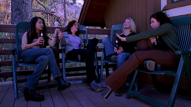 Bickering, drinking and poor cellphone reception signal trouble ahead for the woman next door in Ryan Schifrin's Abominable (2005)