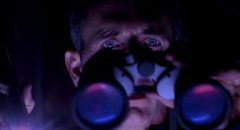 Preston Rogers (Matt McCoy) watches helplessly as a monster stalks the women next door in Ryan Schifrin's Abominable (2005)