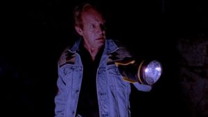 Over-confident hunter Ziegler (Lance Henriksen) wanders off to investigate noises in the night in Ryan Schifrin's Abominable (2005)