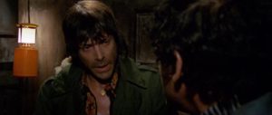 Giullio (Tomas Milian) loses patience with his partners in the kidnapping in Umberto Lenzi's Almost Human (1974)