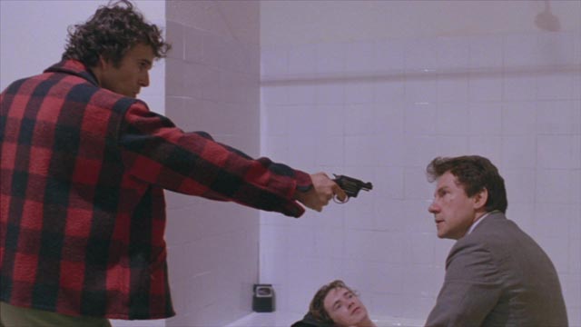 Leo (John Lydon) provokes escalating conflict between O'Connor (Harvey Keitel) and his partner Bob Carvo (Leonard Mann) in Roberto Faenza's Copkiller (aka Corrupt, 1983)