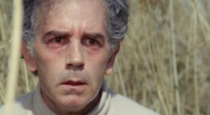 Professor Eduardo Ranieri (Riccardo Cucciolla) realizes he was seen committing murder in Vittorio Salerno's No, the Case is Happily Resolved (1973)