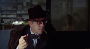 Newspaperman Giannoli (Enrico Maria Salerno) is suspicious of the official story of the murder in Vittorio Salerno's No, the Case is Happily Resolved (1973)