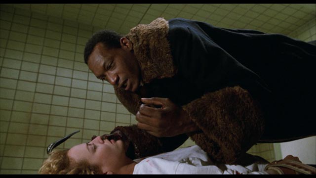 Tony Todd's killer ghost schemes to destroy Helen (Virginia Madsen)'s complacent life so she'll have to join him in Bernard Rose's Clive Barker adaptation Candyman (1992)