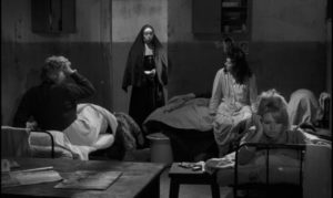 Dominique (Brigitte Bardot) is woken on the morning of her trial in Henri Georges Clouzot's La verite (1960)