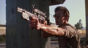 Two-fisted gun action: Olivier Gruner in Albert Pyun's Nemesis (1992)