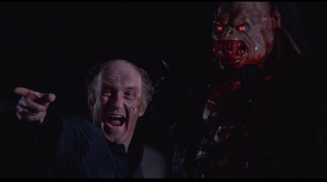 The Verger (Declan O'Brien) becomes a fanatical acolyte of the monster in George Pavlou's Clive Barker adaptation Rawhead Rex (1986)