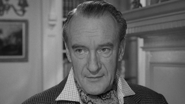 Gordon Zellaby (George Sanders) approaches the strange children with scientific interest and detachment in Wolf Rilla's Village of the Damned (1960)