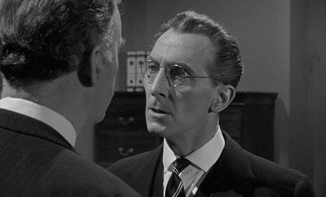Martinet bank manager Harry Fordyce (Peter Cushing) is no match for Colonel Gore Hepburn (André Morell) in Quentin Lawrences's Cash on Demand (1961)