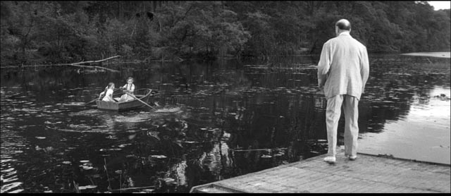 Clarence Olderberry Sr. (Felix Aylmer) pursues Jean (Janina Faye) and her friend Lucille (Frances Green) through the woods in Cyril Frankel's Never Take Sweets from a Stranger (1960)