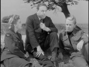 Writer J.B. Priestley pauses on a country walk to conjure the dream of a better future in Basil Dearden's They Came to a City (1944)