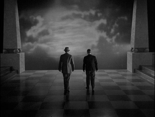 Sir George Gedney (A.E. Matthews) and Mr. Cudworth walk away from the Utopian dream in Basil Dearden's They Came to a City (1944)