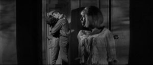 Annette (Liliane Brousse) spies jealously on her stepmother Eve Beynat (Nadia Gray) and Jeff Farrell (Kerwin Matthews) in Michael Carreras' Maniac (1963)