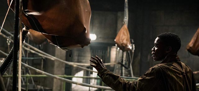 Private Boyce (Jovan Adepo) discovers perverse gestation sacks in the subterranean lab in Julius Avery's Overlord (2018)
