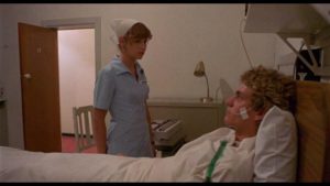 Idealistic nurse Kathy (Susan Penhaligon) develops an unhealthy attachment to her patient in Richard Franklin's Patrick (1978)