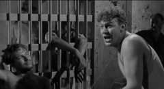 Larry "Lonesome" Rhodes (Andy Griffith performs in a smalltown Arkansas jail in Elia Kazan's A Face in the Crowd (1957)