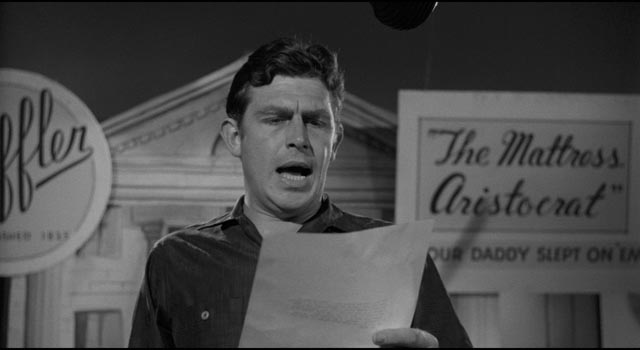 Lonesome (Andy Griffith) ridicules his sponsor's message in Elia Kazan't A Face in the Crowd (1957)
