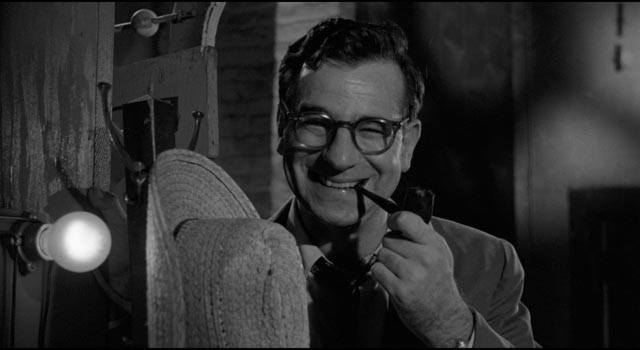 Mel Miller (Walter Matthau) initially views Lonesome (Andy Griffith)'s act with smug condescension, but eventually sees the danger in Elia Kazan's A Face in the Crowd (1957)