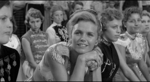 Cheerleader Betty Lou Fleckham (Lee Remick)'s adoration of the star makes her vulnerable to cruel exploitation in Elia Kazan's A Face in the Crowd (1957)