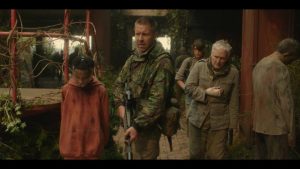 Malanie leads Paddy Considine, Gemma Arterton and Glenn Close into the zombie-infested city in Colm McCarthy's The Girl with All the Gifts (2016)