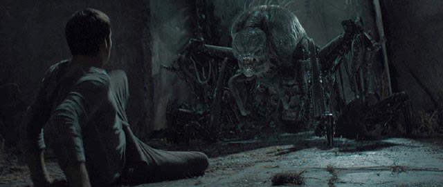 Thomas (Dylan O’Brien) confronts a biomechanical Griever in Wes Ball's Maze Runner (2014)