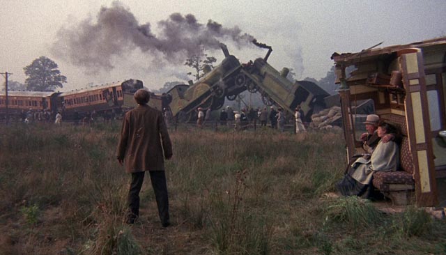 Joseph Finsbury (Ralph Richardson) surveys the liberating train wreck in Bryan Forbes' The Wrong Box (1966)