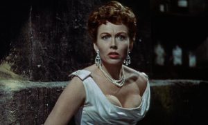 Janine Du Bois (Hazel Court) discovers the awful truth about the man she loves in Terence Fisher's The Man Who Could Cheat Death (1959)