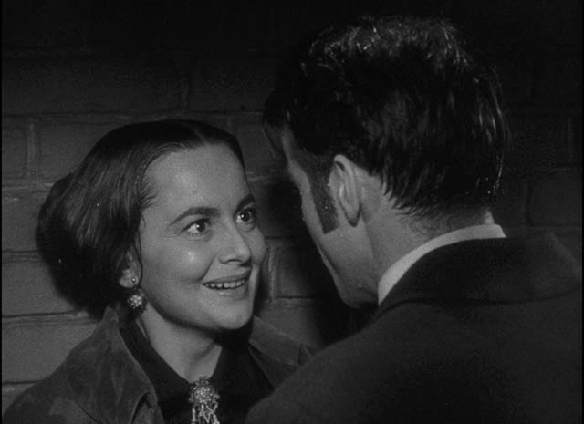 Catherine (Olivia de Havilland) is overjoyed at the prospect of eloping with Morris (Montgomery Clift) in William Wyler's The Heiress (1949)