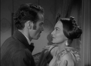 Morris (Montgomery Clift) imposes on Catherine (Olivia de Havilland)'s space as he courts her ... but she learns to resist his temptation in William Wyler's The Heiress (1949)