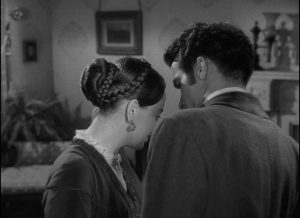 Morris (Montgomery Clift) presses, Catherine (Olivia de Havilland) resists in the awkward emotional ritual of courtship in William Wyler's The Heiress (1949)