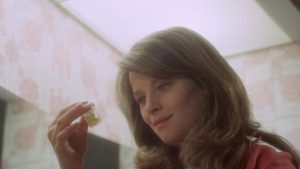 Barbara (Charlotte Rampling) is unable to give up her pills in Roy Ward Baker's Amicus anthology Asylum (1972)