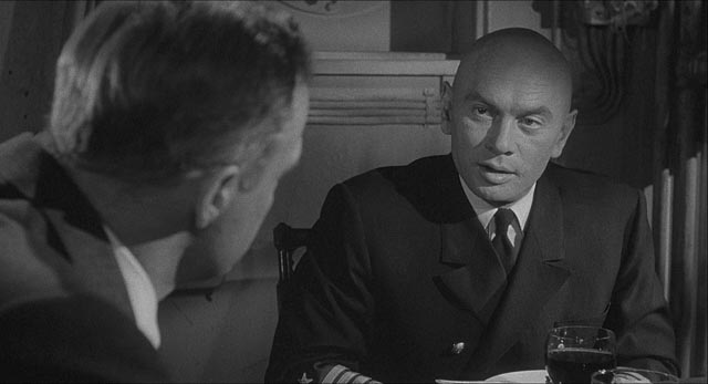 Captain Mueller (Yul Brynner) dislikes having an SS officer on his ship in Bernhard Wicki's Morituri (1965)