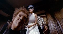 Reality and fantasy blend at a masked ball in Paul Wendkos' The Mephisto Waltz (1971)