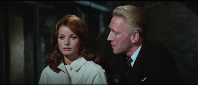 Oktober (Max von Sydow) uses Inge (Senta Berger) to manipulate Quiller (George Segal) in Michael Anderson's The Quiller Memorandum (1966)