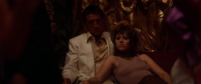 Bree Daniels (Jane Fonda) retreats to the false security offered by her pimp (Roy Scheider) in Alan Pakula's Klute (1971)