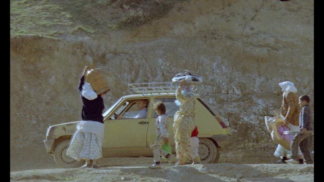 The Director (Farhad Kheradmand) tries to find a way back to Koker through the earthquake devastation in Abbas Kiarostami's And Life Goes On (1992)
