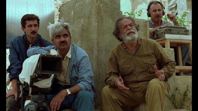 The Director (Mohammad Ali Keshavarz) is frustrated that his non-professional actors can't seem to get their lines right in Abbas Kiarostami's Through the Olive Trees (1994)