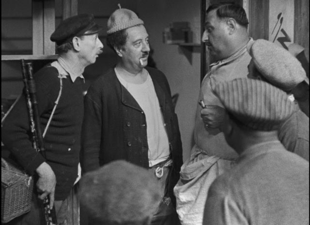 Aimable (Raimu) becomes the butt of ribald jokes after Aurélie (Ginette Leclerc) runs away in Marcel Pagnol's The Baker's Wife (1938)