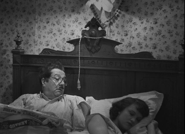 With all his attention on work, Aimable (Raimu) is unaware of Aurélie (Ginette Leclerc)'s dissatisfaction in Marcel Pagnol's The Baker's Wife (1938)