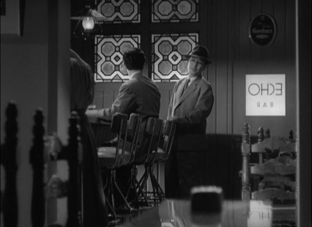 ... but is happy and relaxed having an after-work drink with his protege Non-chan (Koji Tsuruta) in Ozu Yasujiro's The Flavor of Green Tea Over Rice (1952)