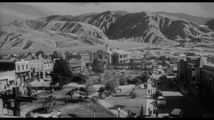 Danger lurks in the hills above a peaceful desert town in John Sherwood's The Monolith Monsters (1957)