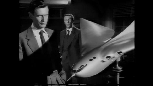 Michael Heathley (James Donald) has idealistic hopes for his experimental plane, the M-7, in Anthony Asquith's The Net (1953)