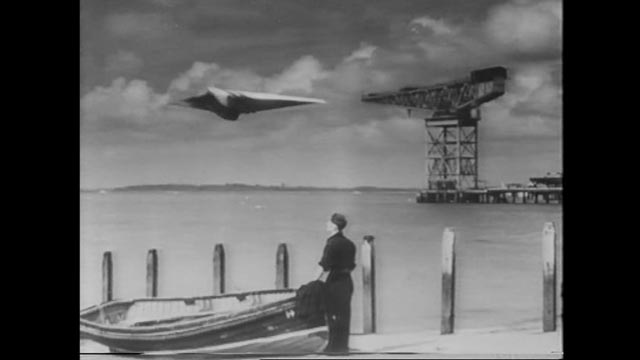 Heathley (James Donald) and Brian (Patric Doonan) take the M-7 up for a test flight without authorization in Anthony Asquith's The Net (1953)