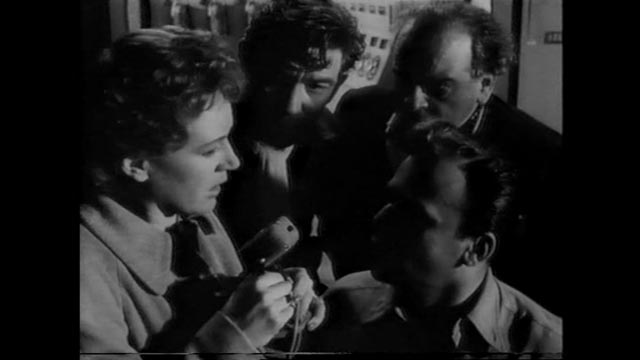 Lydia (Phyllis Calvert)'s voice over the radio brings Heathley (James Donald) back from the brink of disaster in Anthony Asquith's The Net (1953)