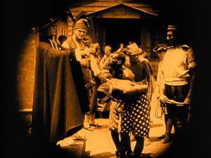 A slave market in the romanticized Old South in D.W. Griffith's Birth of a Nation (1915)