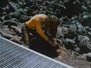 A crazed fellow time traveler tries to kill Karen (Kelley Bohanon) in Peter Fonda's Idaho Transfer (1973)